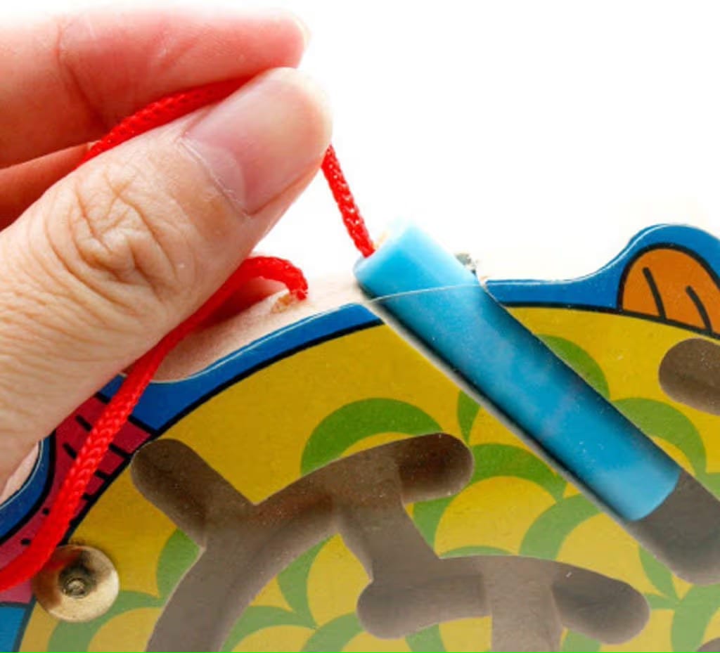 Wooden magnetic maze