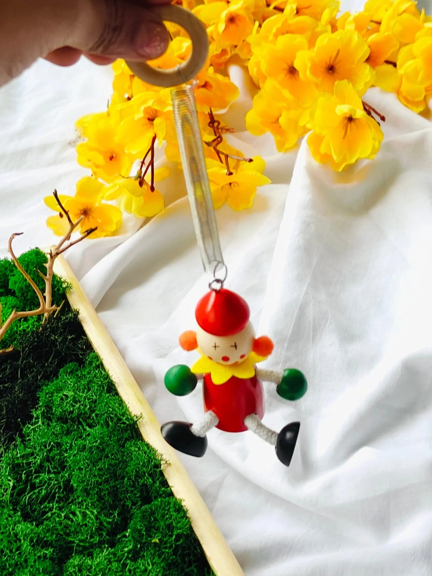 Hanging dancing doll