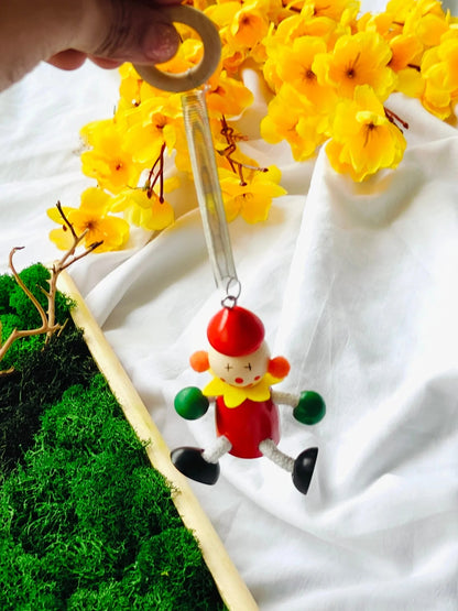 Hanging dancing doll