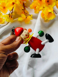 Hanging dancing doll